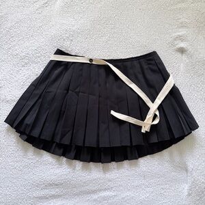 GLOWNY RILEY PLEATED MINI SKIRT